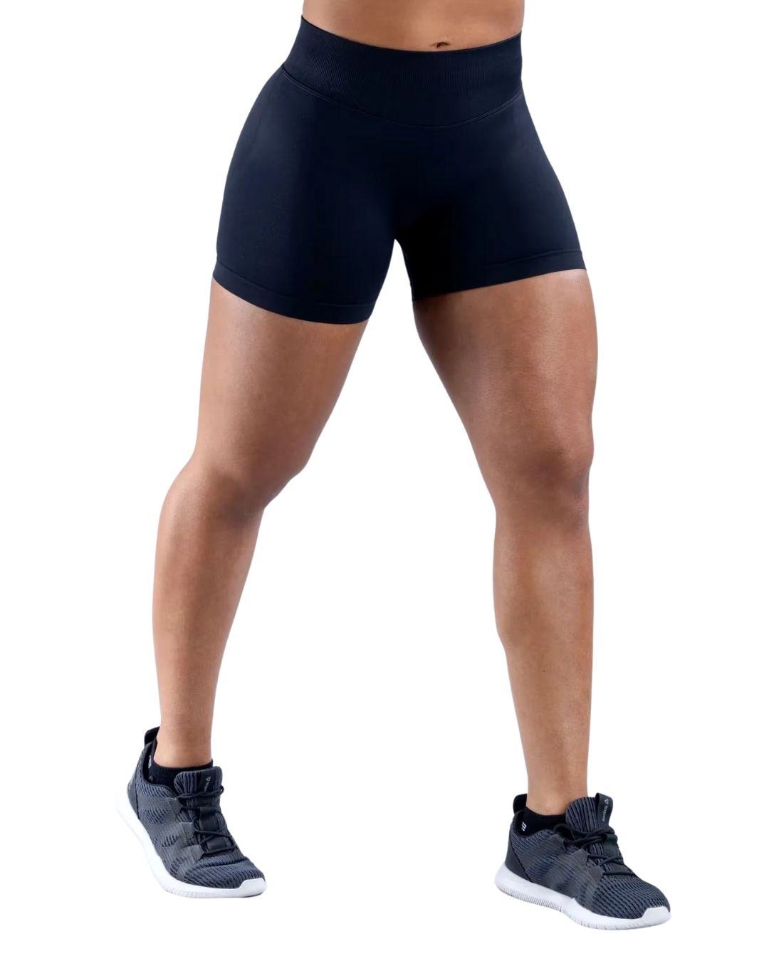 Black high-waisted impact shorts showcasing durable fabric and subtle glute contour.