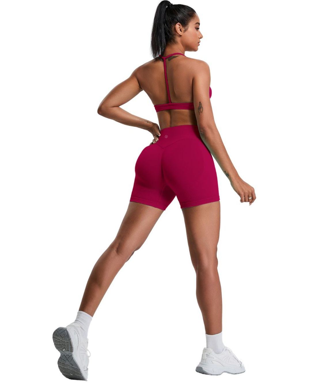 Woman wearing ORU ELURA SPORTS BRA with 4-way stretch knit and T-shape back in maroon