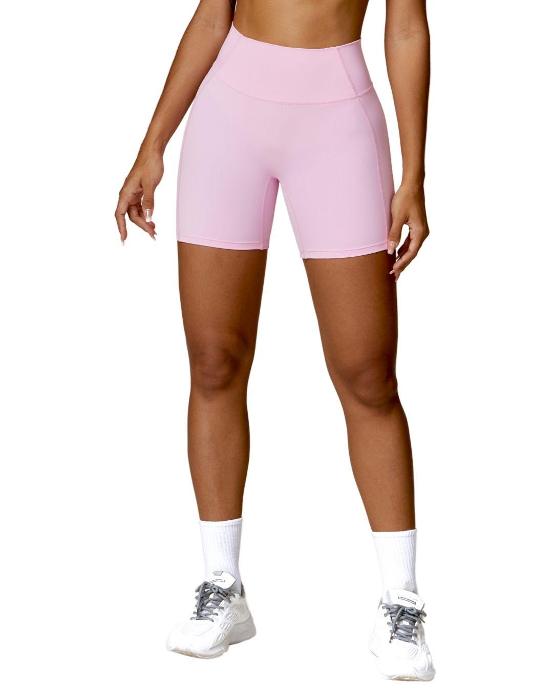 Pink ORU MIKA SHORTs with V-shaped back design, breathable, quick-dry, and 4-way stretch for gym and yoga.