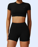 ORU Hollow Back Cropped Top black slim fit seamless workout top with open back and removable padding
