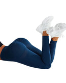 Navy blue seamless high-waist Studio Endure Leggings made from breathable, quick-dry, stretchy fabric with sweat-wicking and compression features.