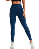 Women wearing blue high-waist seamless studio endure leggings with breathable, quick-dry fabric and white sneakers