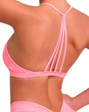 Back view of ORU Strappy Sports Bra in pink with thin multi-strap design and smooth, breathable fabric